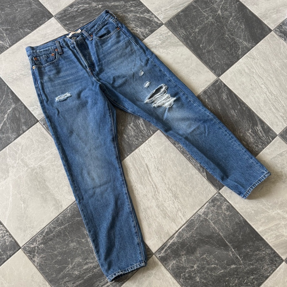 Distressed Blue Denim Jeans